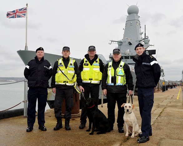 Drugs dogs practice following their nose on board warship
