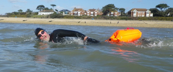 Former Raleigh CO attempts tough ocean swim for charity