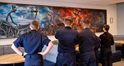 Raleigh trainees admire the large artwork.