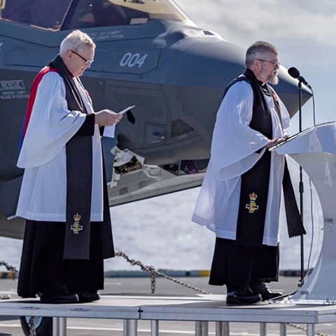 Two Chaplains conducting a service
