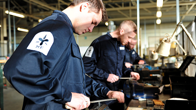 An Advanced Apprenticeship Air Engineering rating working on Royal Navy kit.