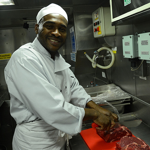 Royal Navy Chef at work on a submarine