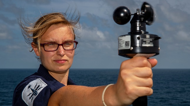 Royal Navy Hydrography and Meterology Specialist checking wind speed