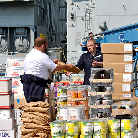 Logistics Supply Officer standing on board a ship