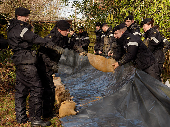 Royal Navy personnel providing relief from floods in Hampshire. 