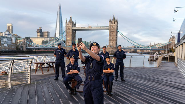 Royal Navy Reservists talking a selfie