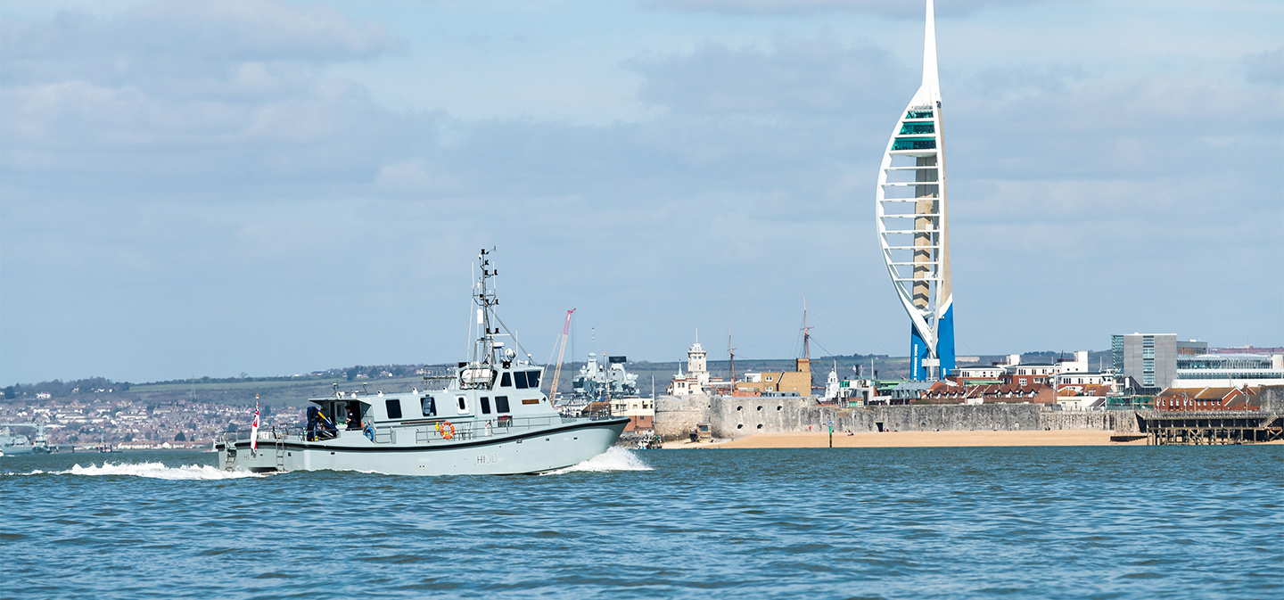 HMS Magpie sailing past the Spinnaker Tower