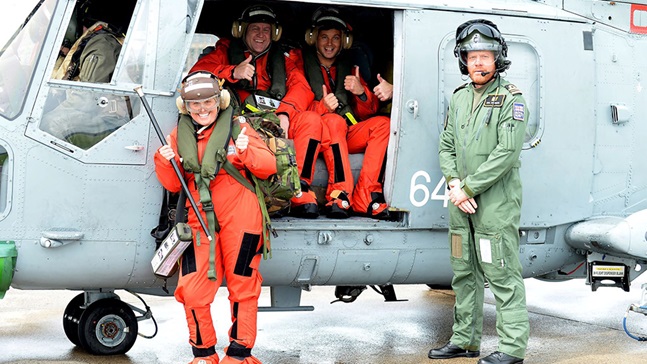 Crew in front of a wildcat helicopter
