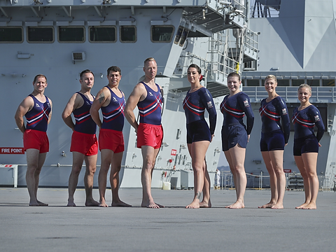 group of royal navy gymnasts  lined up on deck