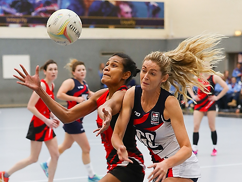 netball opponents competing for ball