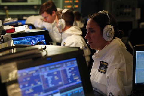 Commanding Officer HMS Duncan, Commander Eleanor Stack, in the Ops Room during state 1 action stations.