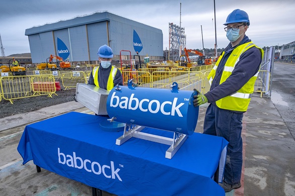 Babcock placed a time capsule in the footings of the new ship hall