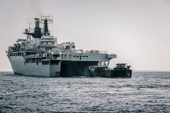 A Royal Marines landing craft emerges from HMS Albion's dock off Cyprus