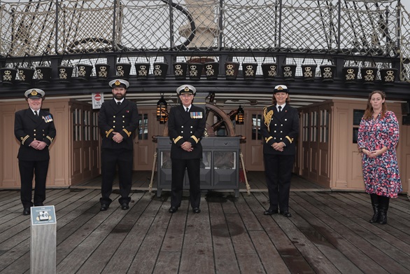 Commodore David Eagles (centre) with his staff aboard HMS Victory