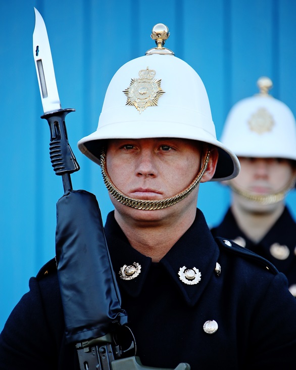 A member of the Royal Marines Guard of Honour at attention with bayonet fixed