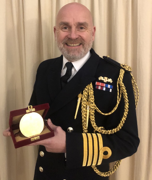 Captain Ian Lynn with his award from the Indian Defence College