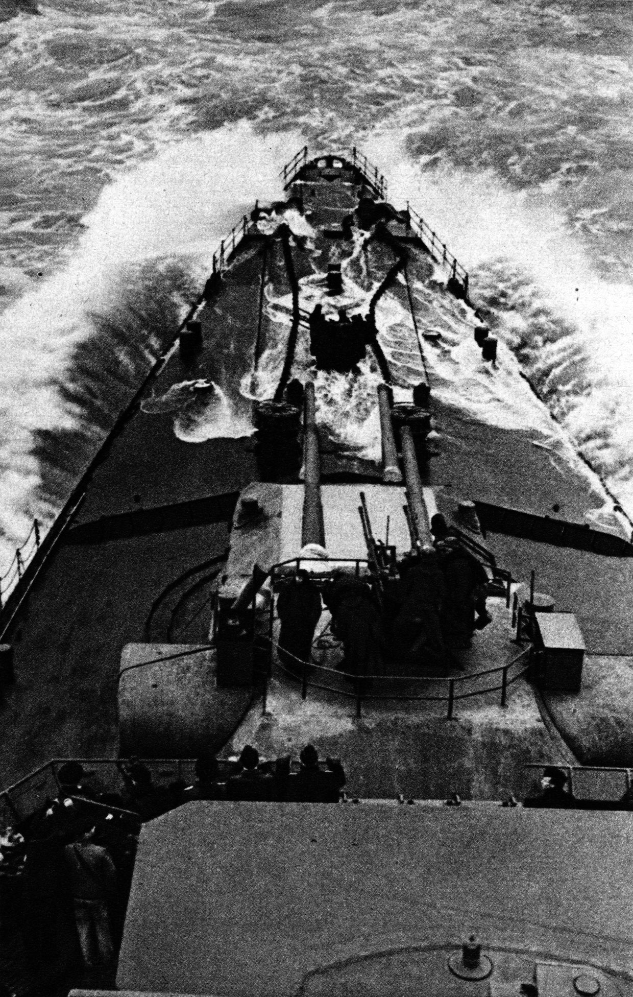 The Channel crashes over the bow of the Prinz Eugen