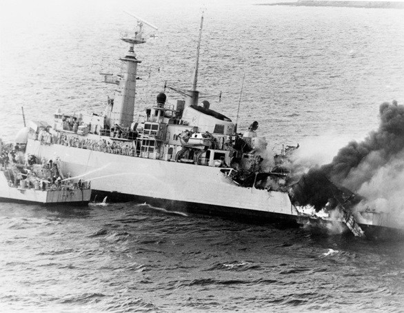 HMS Ardent's stern is aflame after a succession of attacks