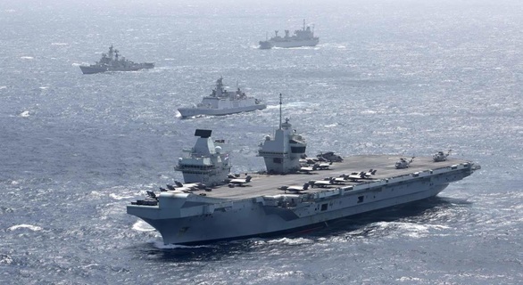 HMS Queen Elizabeth leads the Carrier Strike Group on exercises with the Indian Navy