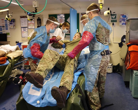 Commando Training Centre Royal Marines medical staff demonstrate the treatment of heat illness in recruits 