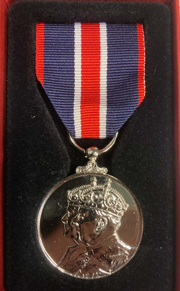 A close-up of the Coronation Medal