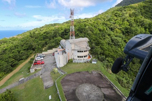 An 815 NAS Wildcat prepares to land at Montserrat's volcano observatory