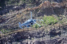 A Merlin Mk4 of 845 NAS flies over Montserrat
