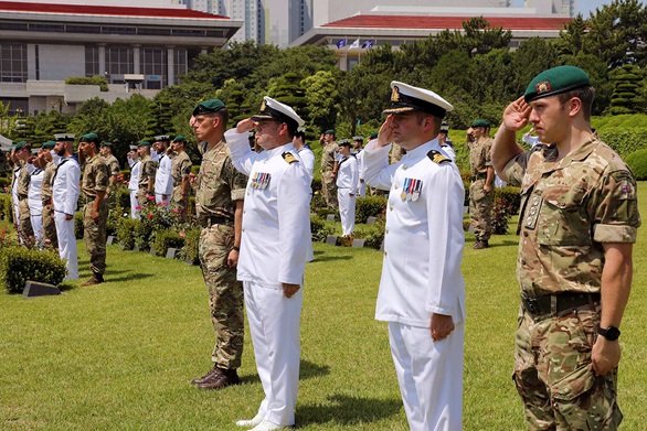 HMS Albion honours war dead in rare Far East visit