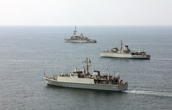 Bottom to top RSNF Al-Shaqra, HMS Brocklesby and USS Dextrous sail in company in the Gulf