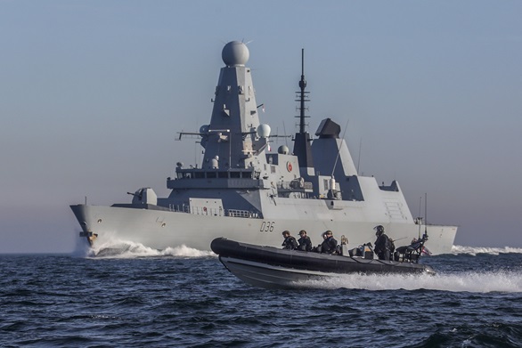 HMS Defender and one of her sea boats