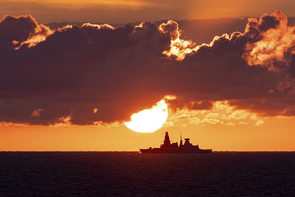 HMS Diamond seen at sunset in the Baltic earlier this autumn as part of HMS Queen Elizabeth 