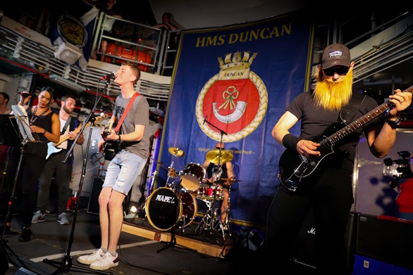 Music fills the hangar on HMS Duncan as members of the ship’s company formed a band and performed a debut gig.