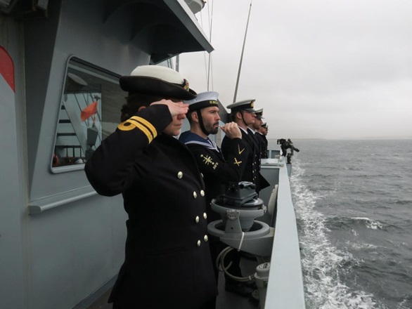 HMS Forth salutes the wrecks of HMS Ardent and Antelope