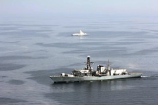 HMS Montrose sails past UAE Warship Ghantut