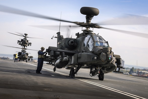 The three Apache gunships arrive on HMS Prince of Wales