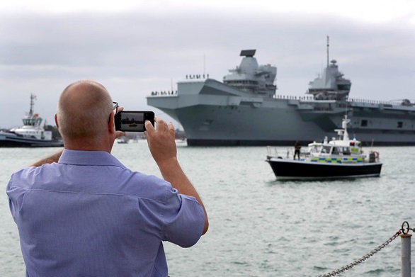 HMS Queen Elizabeth, departs her home port of Portsmouth bound for the USA to land fast jets on deck for the very first time.