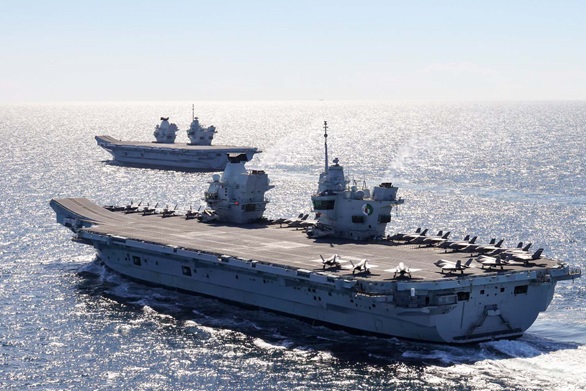 Carriers HMS Queen Elizabeth and HMS Prince of Wales meet up at sea for the first time. Picture: POPhot Jay Allen