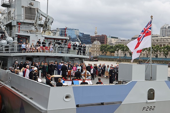 HMS Severn's stern is turned into a mini ampitheatre for the ceremony