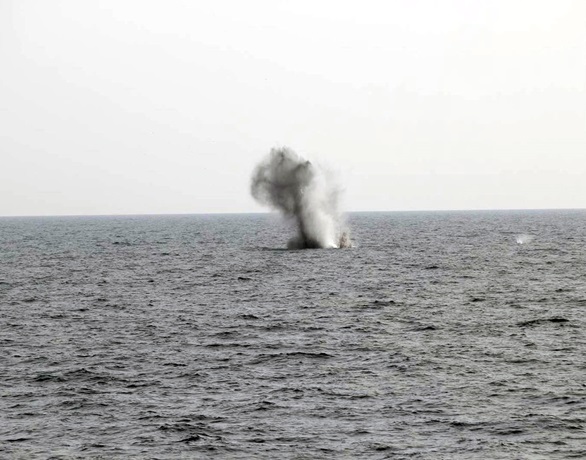 The buoy is blown to pieces by an explosive charge set by Shoreham's divers
