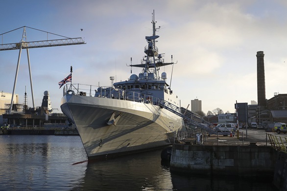 HMS Spey alongside in Portsmouth Naval Base as a Royal Navy warship for the first time