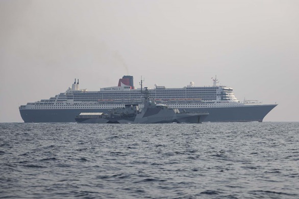 HMS Spey met up with cruiseliner Queen Mary 2 in the Pacific Ocean. Picture: LPhot Kevin Walton