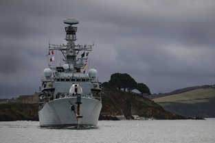 HMS Sutherland passes Drake's Island as the frigate returns to Plymouth from her last day at sea until 2023