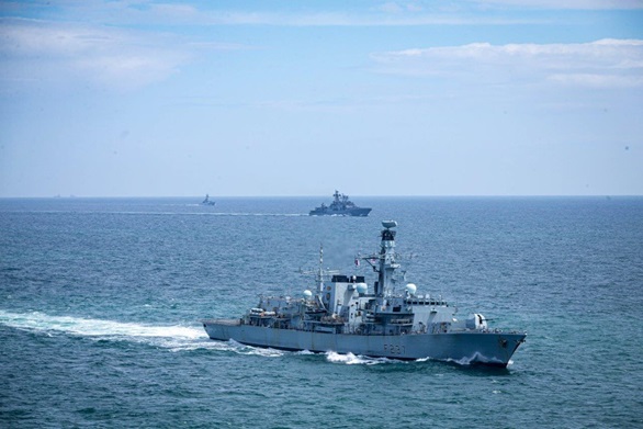 HMS Westminster (foreground) shadows the Russian destroyer Kulakov with HMS Tyne (background)