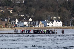Families join forces to welcome submarine home to Faslane