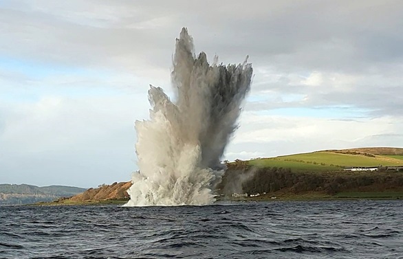 A huge plume of water and mud as the mine is blown up off Bute