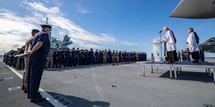 Remembrance service held on board a ship